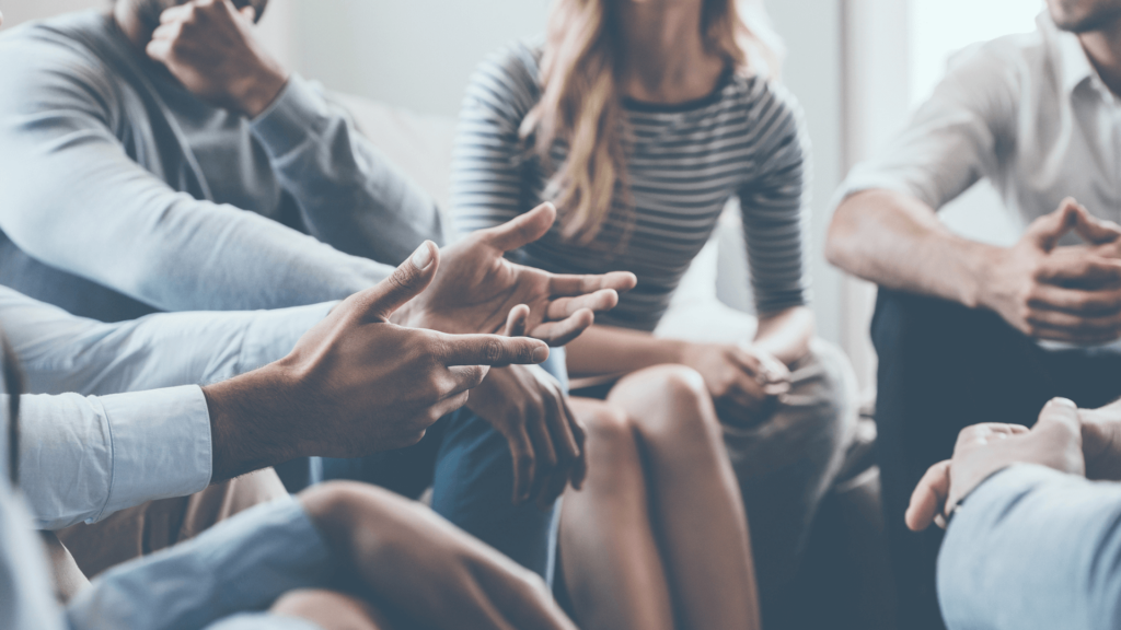 People talking in a group setting