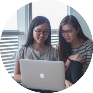 Women looking at a apple laptop