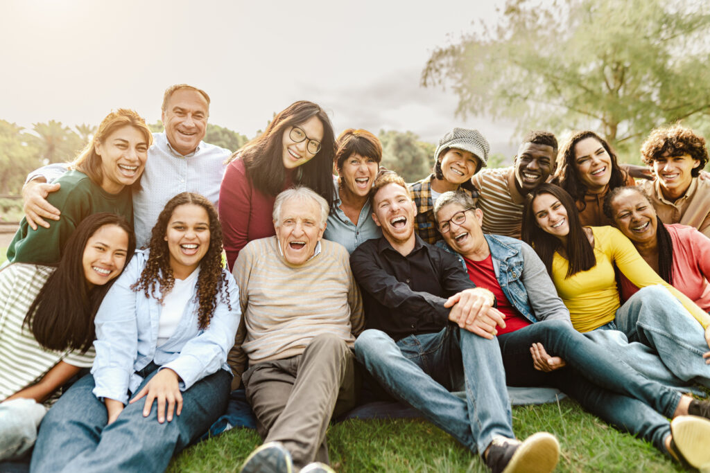 A family smiling and sitting together