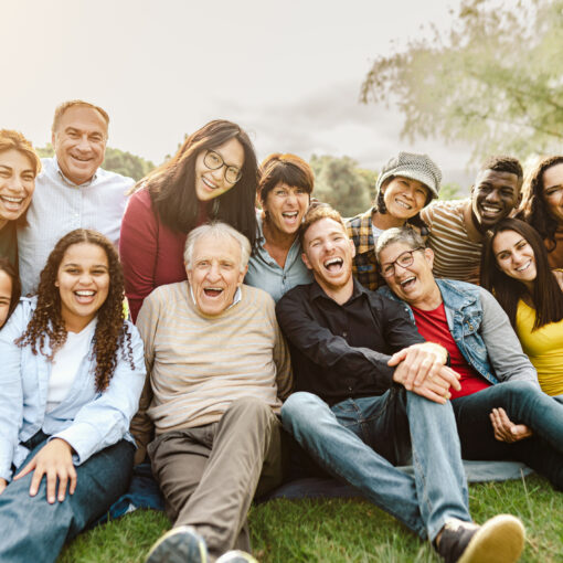 A family smiling and sitting together