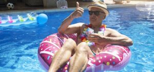 senir man enjoying relaxing swim