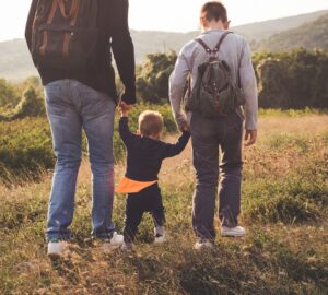 Family walking in field