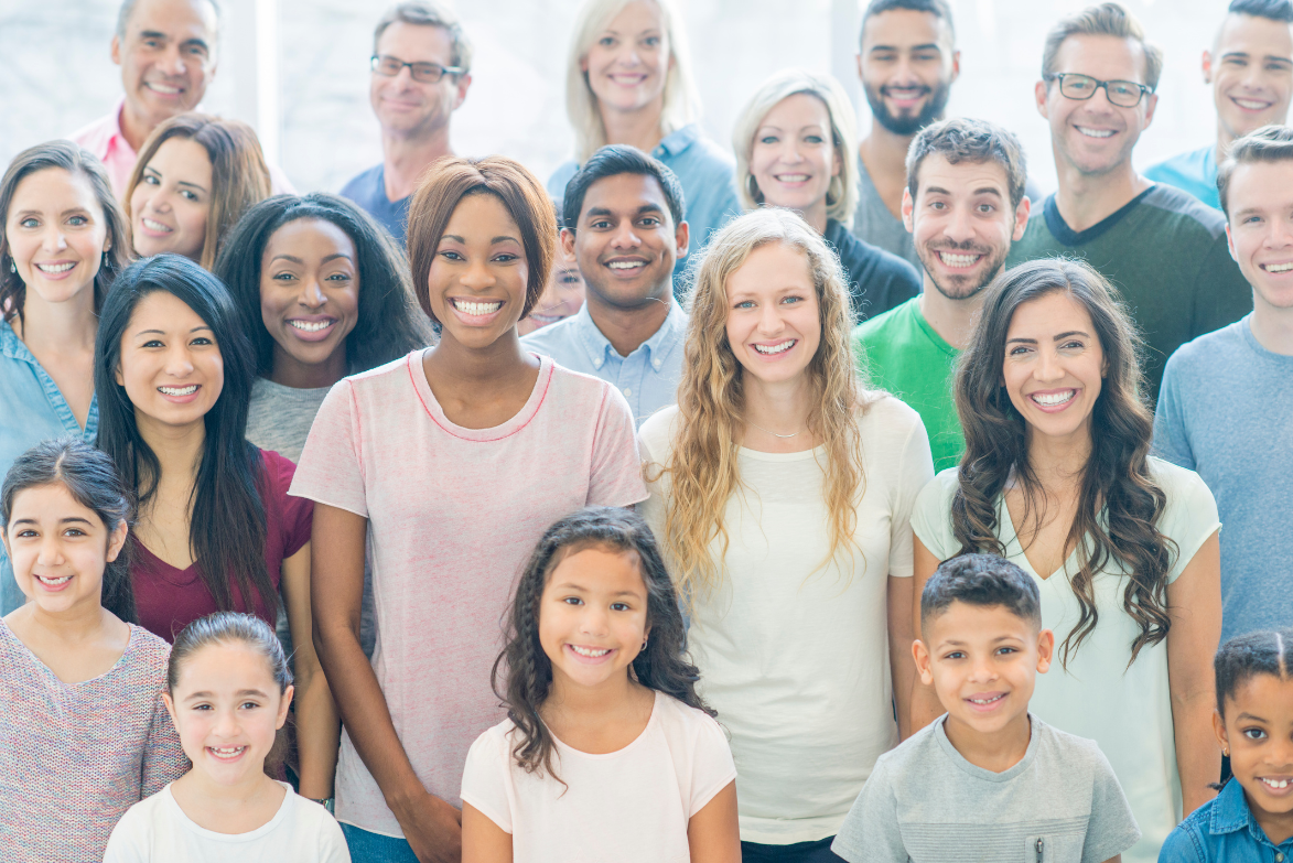 A large group of smiling people