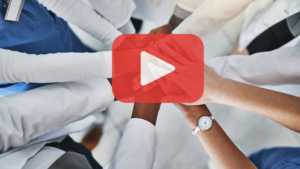 Health-care providers hands come together.