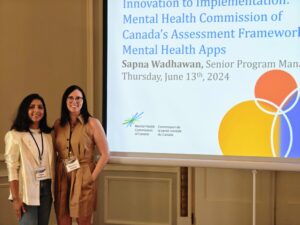 Maureen Abbott, right, with colleague Sapna Wadhawan, program manager at the MHCC, at a recent presentation of the MHCC Mental Health App Assessment Framework.