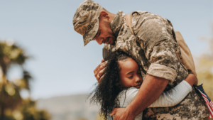 A parent and a child embracing