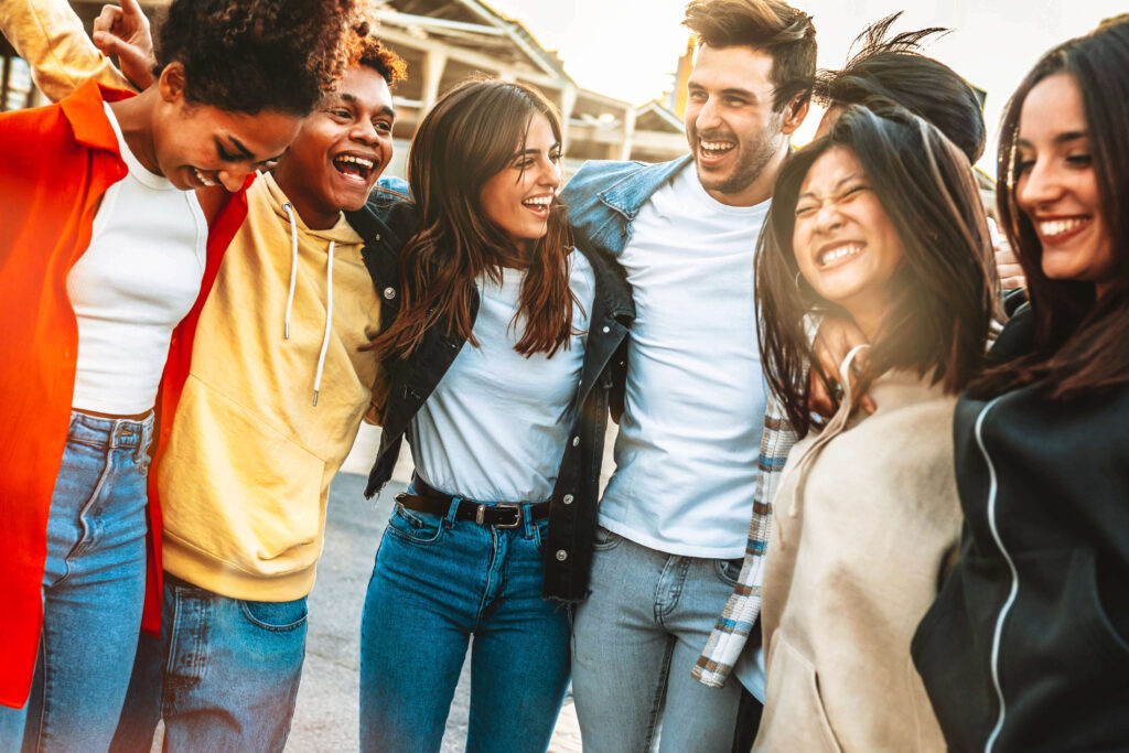 A group of young people laughing together
