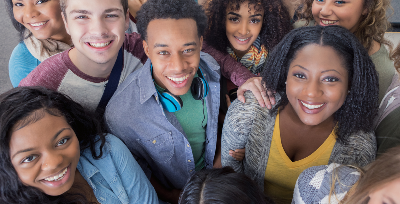 Teenagers posing for a group photo